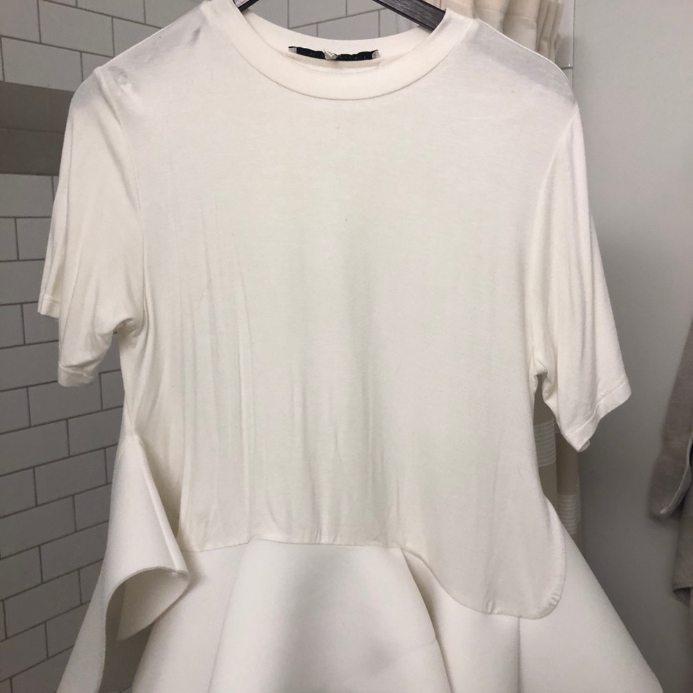 White ruffle shirt